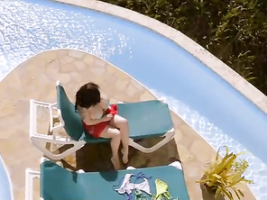 Watch in awe as Roxanne Miller tries on the skimpiest of bikinis.