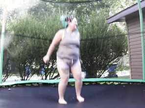 Fatty Tattooed Wife Jumping and Stripping on a Trampoline